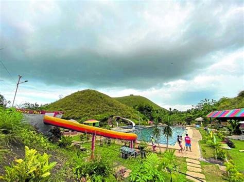 bohol scandal|Bohol governor, 68 others suspended over Chocolate Hills resort mess.